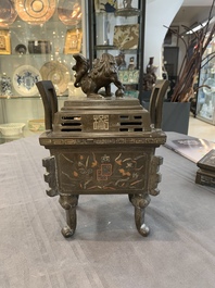 A large Vietnamese copper- and silver-inlaid rectangular 'Buddhist lion' censer and cover on stand, 19th C.