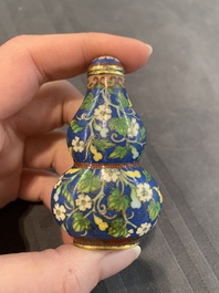 A collection of ten Chinese Canton enamel and porcelain snuff bottles, Qianlong mark, 19/20th C.