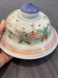 A Chinese famille verte 'ladies and boys' vase and cover, Kangxi