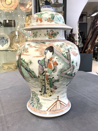 A Chinese famille verte 'ladies and boys' vase and cover, Kangxi