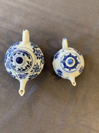Eight Chinese blue and white cups, 14 saucers and four teapots, Kangxi/Qianlong