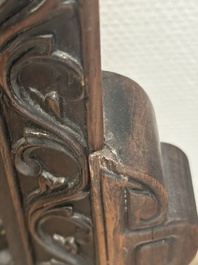 A Chinese wooden table screen with an embroidered silk with turtle design, 19th C.