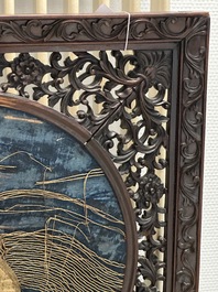 A Chinese wooden table screen with an embroidered silk with turtle design, 19th C.