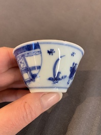 Eight Chinese blue and white cups, 14 saucers and four teapots, Kangxi/Qianlong
