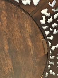 A Chinese wooden table screen with an embroidered silk with turtle design, 19th C.