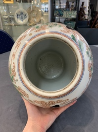 A Chinese famille verte 'ladies and boys' vase and cover, Kangxi