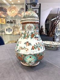 A Chinese famille verte fountain and basin with birds among flowering branches, Kangxi