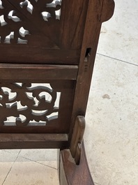 A Chinese wooden table screen with an embroidered silk with turtle design, 19th C.
