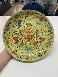 A Chinese famille rose yellow-ground 'bats and peaches' plate, Tongzhi mark and of the period