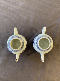 Eight Chinese blue and white cups, 14 saucers and four teapots, Kangxi/Qianlong