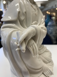 Three Chinese Dehua blanc de Chine figures of Guanyin, 20th C.