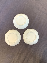 Eight Chinese blue and white cups, 14 saucers and four teapots, Kangxi/Qianlong