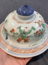 A Chinese famille verte 'ladies and boys' vase and cover, Kangxi