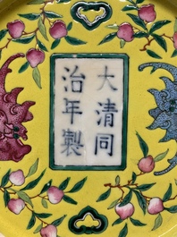 A Chinese famille rose yellow-ground 'bats and peaches' plate, Tongzhi mark and of the period