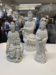 Three Chinese Dehua blanc de Chine figures of Guanyin, 20th C.