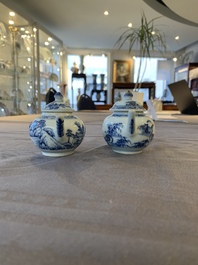 Eight Chinese blue and white cups, 14 saucers and four teapots, Kangxi/Qianlong