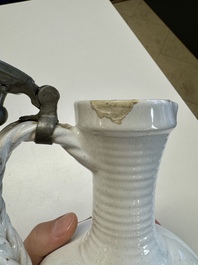 A pewter-mounted white Dutch Delftware jug, 17th C.