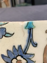 A polychrome Iznik pottery tile with floral design, Turkey, 17th C.