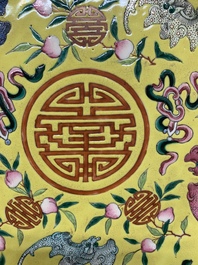 A Chinese famille rose yellow-ground 'bats and peaches' plate, Tongzhi mark and of the period