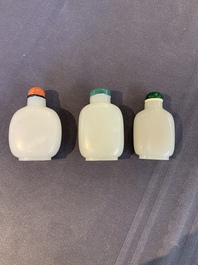 Seven Chinese white and celadon jade snuff bottles, 19th C.