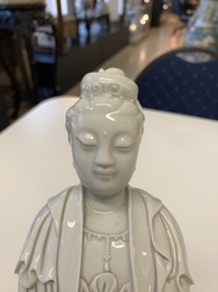 Three Chinese Dehua blanc de Chine figures of Guanyin, 20th C.