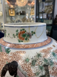 A Chinese famille verte 'ladies and boys' vase and cover, Kangxi