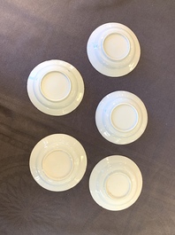 Eight Chinese blue and white cups, 14 saucers and four teapots, Kangxi/Qianlong