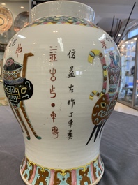 Three Chinese famille rose vases, one with cover, signed Wu Yu 吴玉, dated 1912