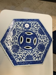 A Chinese blue and white hexagonal 'lotus scroll' garden seat, Qianlong/Jiaqing