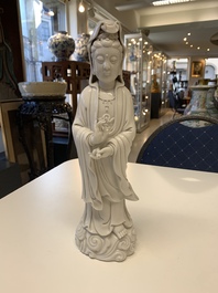 Three Chinese Dehua blanc de Chine figures of Guanyin, 20th C.