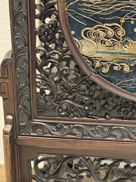 A Chinese wooden table screen with an embroidered silk with turtle design, 19th C.