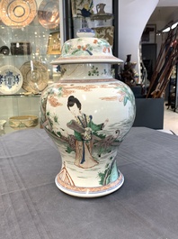 A Chinese famille verte 'ladies and boys' vase and cover, Kangxi