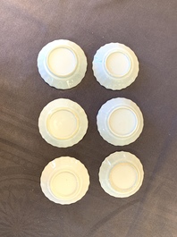 Eight Chinese blue and white cups, 14 saucers and four teapots, Kangxi/Qianlong