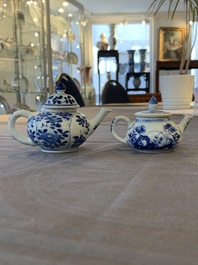 Eight Chinese blue and white cups, 14 saucers and four teapots, Kangxi/Qianlong