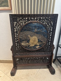 A Chinese wooden table screen with an embroidered silk with turtle design, 19th C.