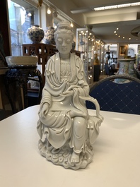 Three Chinese Dehua blanc de Chine figures of Guanyin, 20th C.