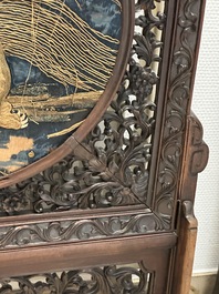 A Chinese wooden table screen with an embroidered silk with turtle design, 19th C.