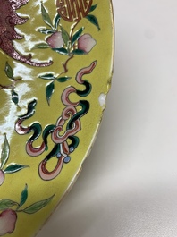 A Chinese famille rose yellow-ground 'bats and peaches' plate, Tongzhi mark and of the period