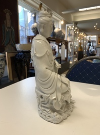 Three Chinese Dehua blanc de Chine figures of Guanyin, 20th C.
