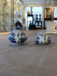 Eight Chinese blue and white cups, 14 saucers and four teapots, Kangxi/Qianlong