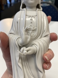 Three Chinese Dehua blanc de Chine figures of Guanyin, 20th C.