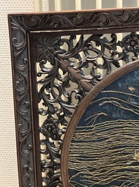 A Chinese wooden table screen with an embroidered silk with turtle design, 19th C.