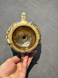 A Chinese Cizhou 'cadogan' ewer with dragons, Yuan/Ming