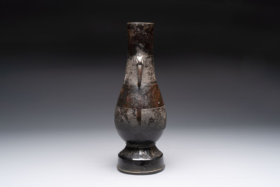 A fine Chinese archaistic bronze 'hu' vase with dragon handles, Yuan