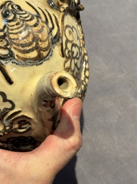 A Chinese Cizhou 'cadogan' ewer with dragons, Yuan/Ming