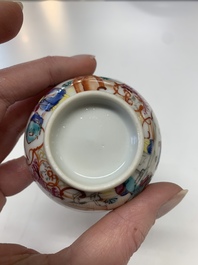 Eight Chinese Canton famille rose cups, 14 saucers and a teapot, Qianlong