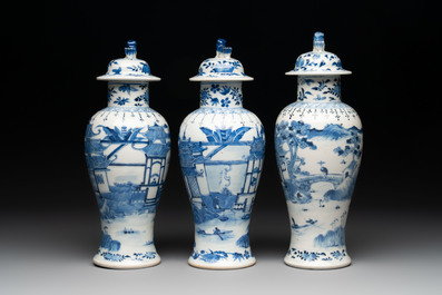 A Chinese blue and white garniture of five vases with landscape design, 19th C.