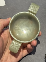 A Chinese white jade bowl with ruyi-shaped handles, wooden cover and stand, 18/19th C.