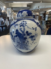 A pair of Chinese blue and white bronze-mounted vases and a covered jar, 19th C.