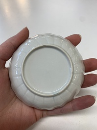 Eight Chinese Canton famille rose cups, 14 saucers and a teapot, Qianlong